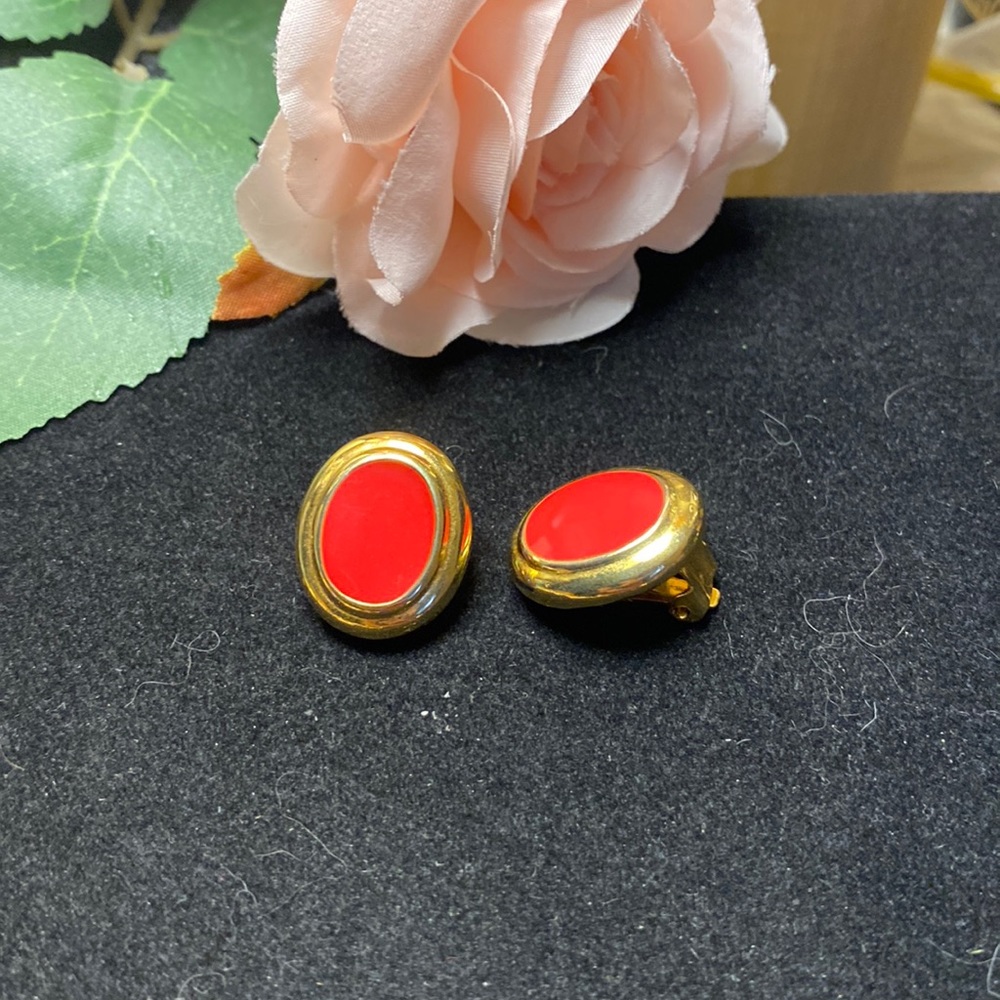 Small oval red clip on earrings
